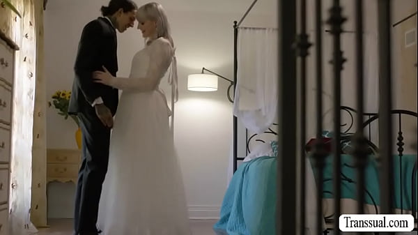 Shemale bride and her future husband are in the room having sex and her brides maid joins them.They start fucking on the bed in threesome way.