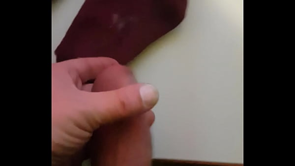 Hot guy cums on red socks