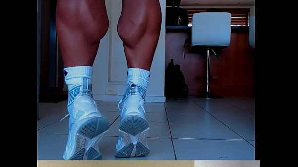muscular legs of female bodybuilder  