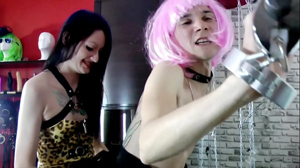 What a beautiful Sissy takes a strapon in her mouth and ass. When Dominatrix Nika is mouth fucked by Sissy, the feminized slut drools a lot.