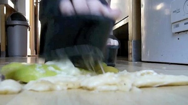 Banana crush whilst dressed in latex dress & high heels