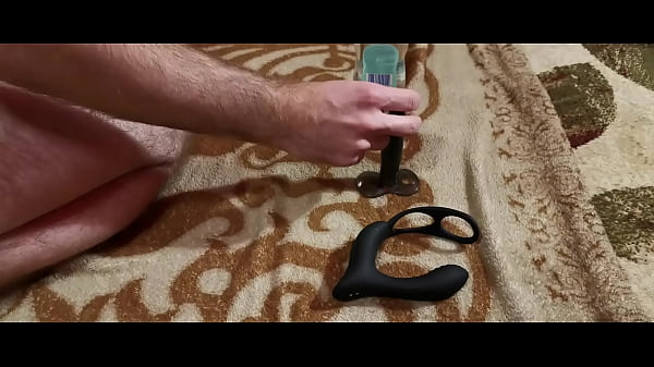 A hairy man gently strokes his anus, cleans himself with fingers and other sex toys and cums loudly from anal prostate massage 