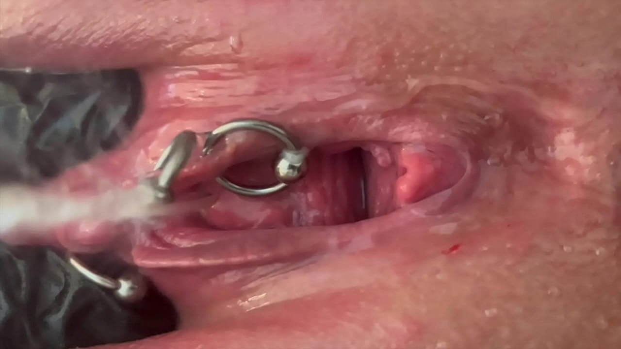 Pee very strong stream from my Pierced Pussy and my hands in Latex Glove
