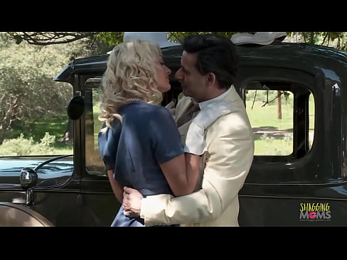 A blonde lady encountered a dangerous man with a gun, and she seduced him with her charm. The man fucked her on his vintage car outside in her sexy lingerie until he finished on her tongue.