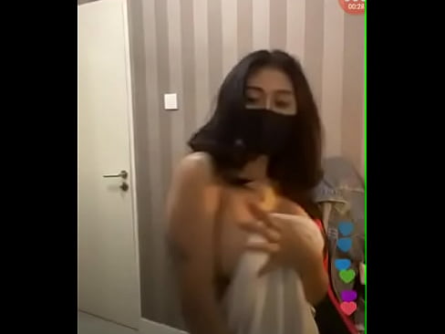 Sexy girl dancing naked wrapped in towel