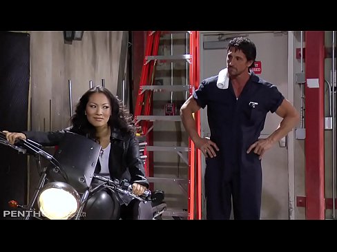 Tommy Gunn has some work to do on a motorcycle, but Asa Akira has something else for him to work on.