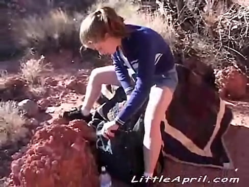 Little April hiking outdoors and then touching her 18yo pussy