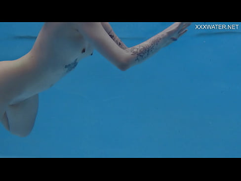 Finnish teen babe Mimi Cica cutest pornstar with tattoos in swimming pool nude