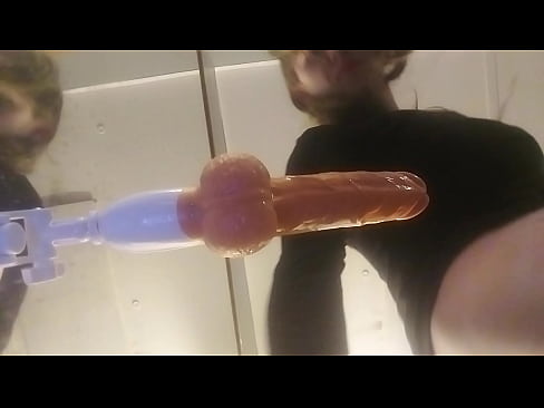 Vibrating thrusting dildo