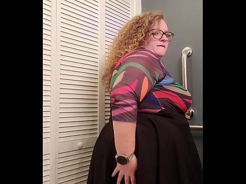 Redhead BBW receptionist bends over and invites you up her skirt