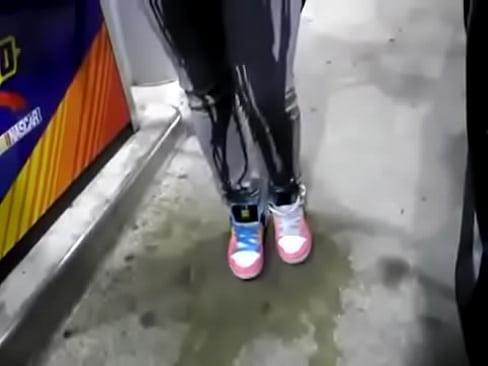 desperate girl wetting pee jeans while pumping gas