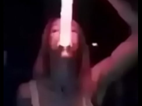 Slut deepthroating glowing dildo