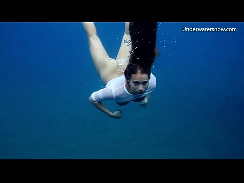 Underwater romantic nude swimming