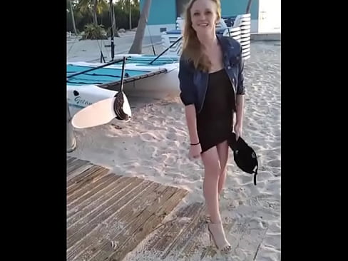 Sexy blonde about to get naked on the beach nice ass slim tits