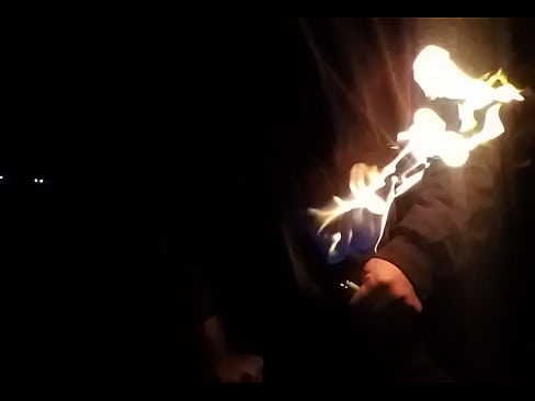 Stroking On Fire at Night