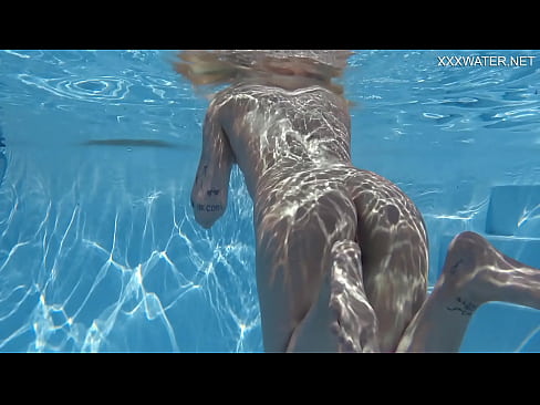 Blonde pornstar Mimi enjoys nude action underwater