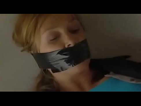 woman tape tied by evil woman