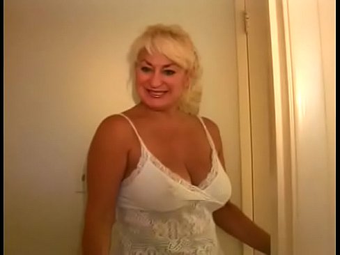 A mature blonde slut with nice big tits sucks a dick until it explodes