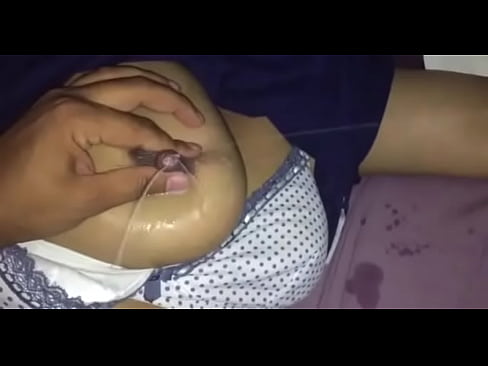 lactating and squirting her breast