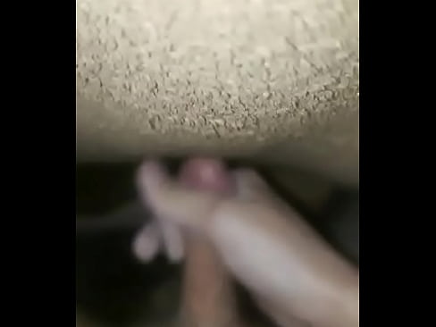Jerking off soft penis in room