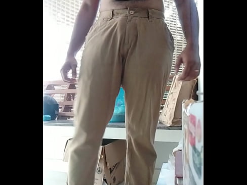 Nude indian boy dressing up to work at home