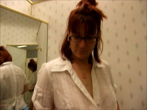 Amateur gives a blowjob in a stores dress in the dressing room
