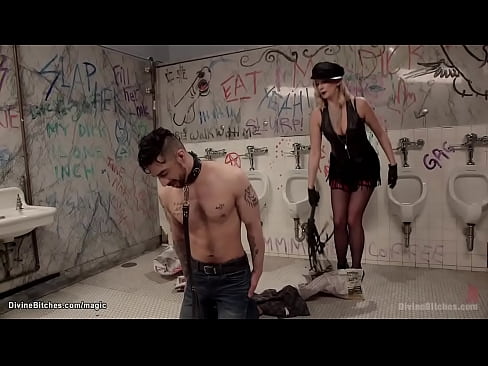 Blonde femdom Maitresse Madeline Marlowe hard whips tattooed men on knees Samir Hott then binds him in straitjacket and pegs in public toilet till rides dildo gag above his face