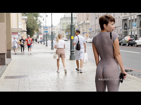 Naughty Lada wear see-through outfit in the city.
