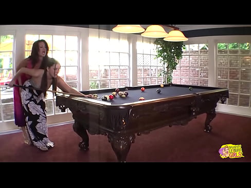Hot chicks play with a dildo at the pool table