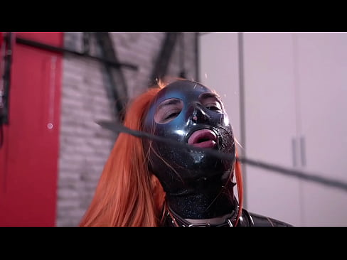 Do you love latex? Watch how the latex doll worships Mistress's legs, kisses them and sucks heels, but receives only slaps and spit from Dominatrix Nika