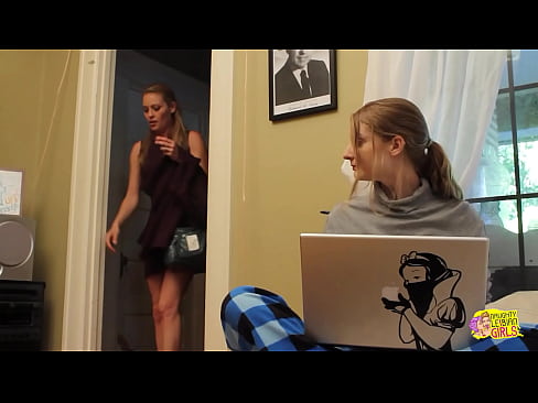 Two slender brunette women clandestinely engage in sexual activity in the kitchen while at work