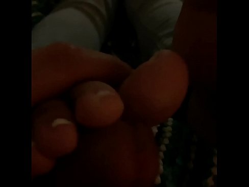 Footjob while she’s on her phone