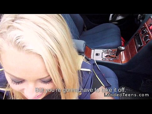Blonde stewardess with nice legs gives blowjob in car