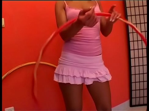European blonde floozie Sandy Silver prepares special tricks with hoola hoop