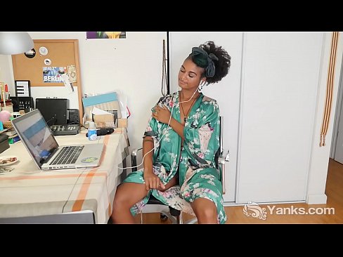 Tempting ebony babe from Yanks Lola Rose fingering her hairy pussy for orgasm while watching porn