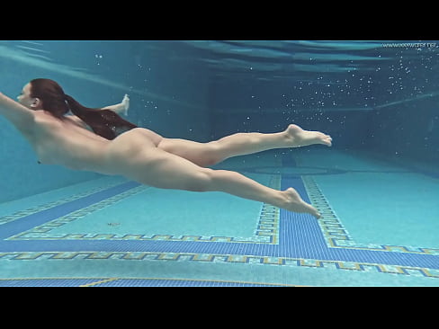 Hungarian babe Sazan Cheharda swims and strips in the pool
