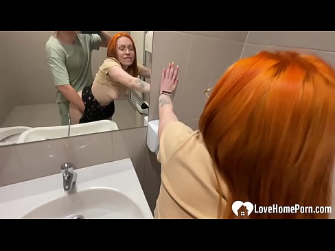 Redhead ready to fuck in public toilet