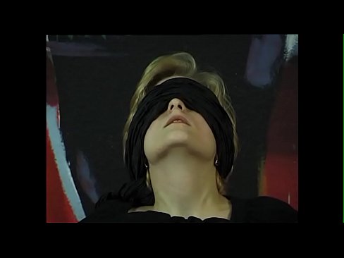 First she blindfolds, then she is allowed to blow