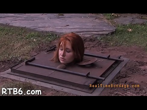 Restrained cutie is punished