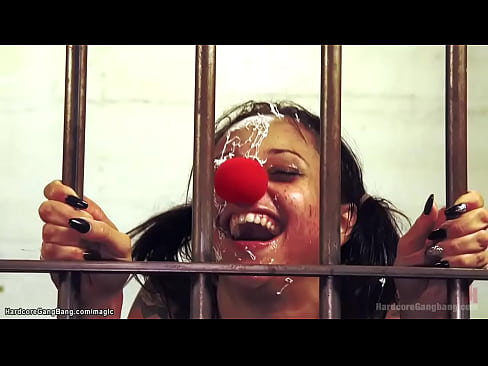 Petite ebony agent Holly Hendrix face fucked by group of big cock clowns then double penetration and anal gangbanged in the prison