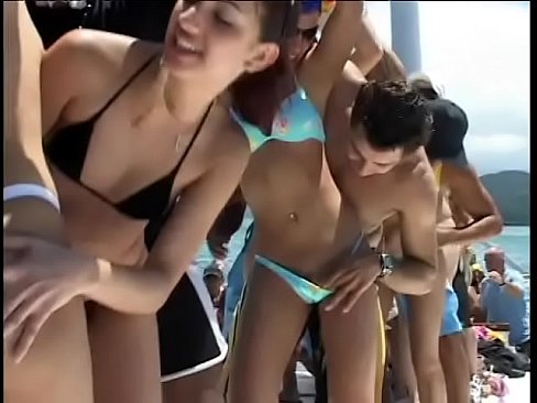 Naghty sunburnt girls in Hawaiian skirts enjoy neverending group sex orgy on the cruising boat