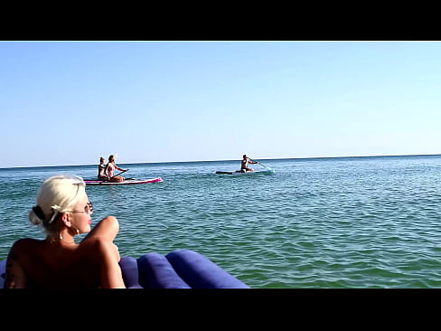 I spy on the beach as a girl with big boobs sunbathes in front of the public and dolphins  I spy on the beach as a girl with big boobs sunbathes in front of the public and dolphins