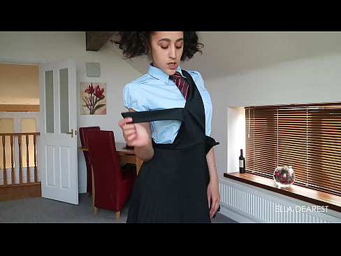 Ella strips out of her uniform