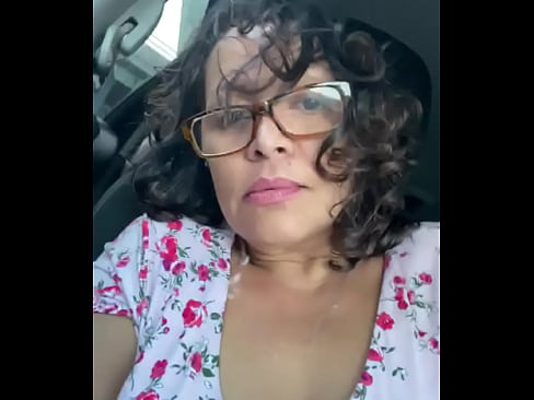 Latina MILF teasing in the car