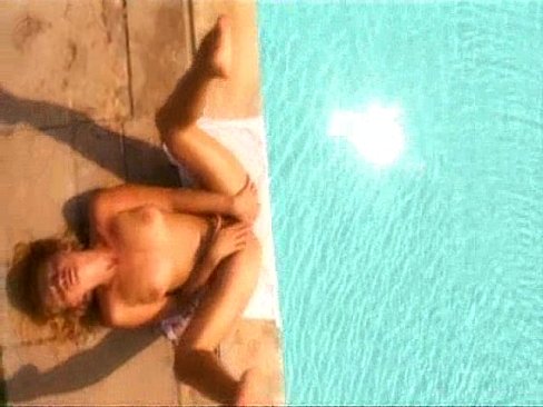 Sexy girl masturbates by the pool