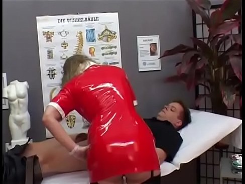 A sexy and dirty nurse in a red latex tight dress gives a blow job and gets fucked