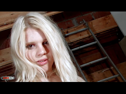 Blond teen is stripping and showing her pink pussy