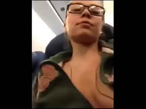 girl shows her treasures at the plane