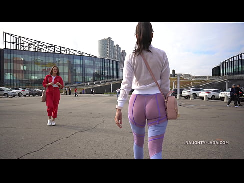 Naughty Lada exposes her pussy and nipples in public