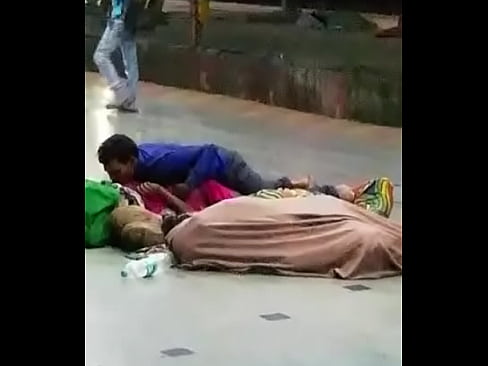Desi Indian couple having sex in open station infront of crowd
